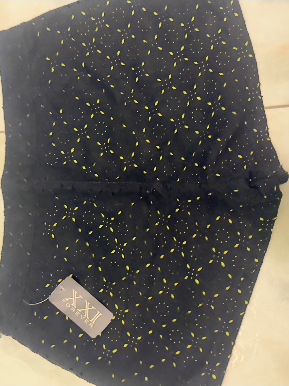 Forever 21 Navy Mini Skirt with Yellow Eyelet Pattern